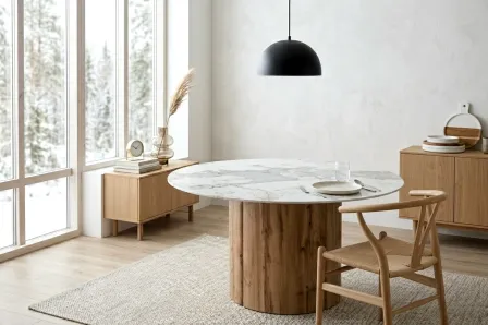 Mesa redonda Vilta com tampo Calacatta e base cilíndrica em madeira