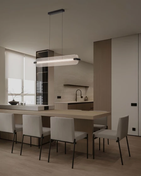 Candeeiro de teto Emery Line linear suspenso sobre mesa de jantar em cozinha moderna